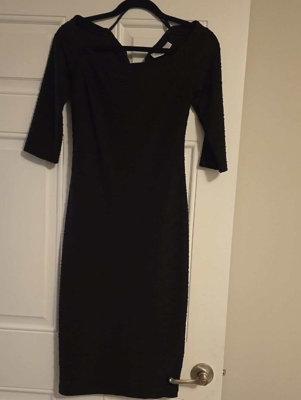 Elegant Black Sheath Dress with Three-Quarter Sleeves